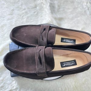Male brown suede penny loafers with a soft textured finish
